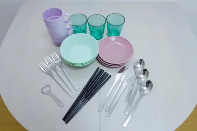 a group of utensils sitting on top of a table at Oakville Nezu by Tranova in Tokyo