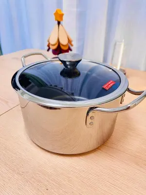 a pot sitting on top of a wooden table at Motosakura 401 Asakusa Ueno Akihabara Area, Bicycle Rental, 6 Minutes to Station, 2 Simmons Beds, Elevator, Direct Access to Airport in Tokyo