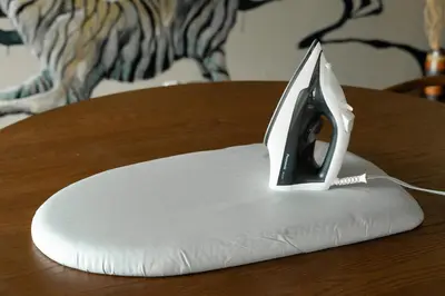 a computer monitor sitting on top of a pillow on a table at \u6674\u30ec\u5c4b \u65b0\u8fb0\u7f8e\u8358 Hareya Shin-Tatsumiso in Tokyo