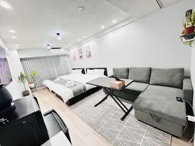 a living room with a couch and a bed at ying-Dōgenzaka,Shibuya city 3F-SY0065 in Tokyo