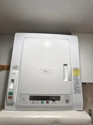 a microwave oven sitting on top of a refrigerator at ying-Dōgenzaka,Shibuya city 3F-SY0065 in Tokyo