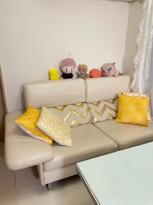 a couch with stuffed animals sitting on top of it at \u671b\u6708\u30cf\u30a6\u30b9201 in Tokyo
