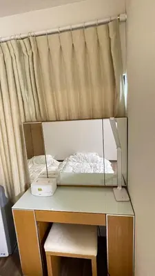 a bed in a mirror on top of a desk at \u671b\u6708\u30cf\u30a6\u30b9201 in Tokyo
