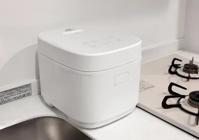 a white kitchenounter with a sink and a stove at ef\u6c60\u888b303 in Tokyo
