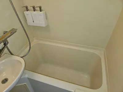a small bathroom with a sink and a bath tub at \u30db\u30c6\u30eb\u30ec\u30b9\u30dd\u30ef\u30fc\u30eb405 in Tokyo