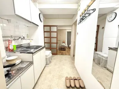 a kitchen with a sink and a counter at Shinjuku Waseda D1 in Tokyo
