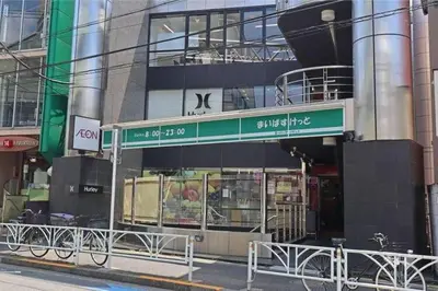 a street sign on the side of a building at Amazing location Harajuku House Shibuya 8pepl 2BR in Tokyo