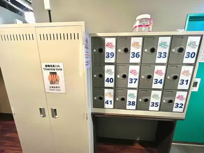 a vending machine with a bunch of lockers at Otemachi Kamon Hotel in Tokyo