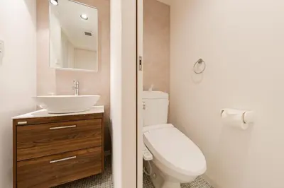 a bathroom with a white toilet and a sink at Newly opened! Hidden Gem in Ikejiri - Quiet Stylish Minutes to Shibuya in Tokyo