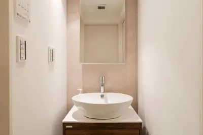 a bathroom with a white sink and a mirror at Newly opened! Hidden Gem in Ikejiri - Quiet Stylish Minutes to Shibuya in Tokyo
