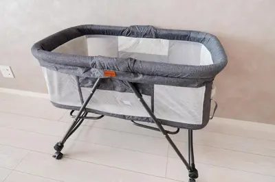 a gray baby carrier sitting on a stool at Newly opened! Hidden Gem in Ikejiri - Quiet Stylish Minutes to Shibuya in Tokyo