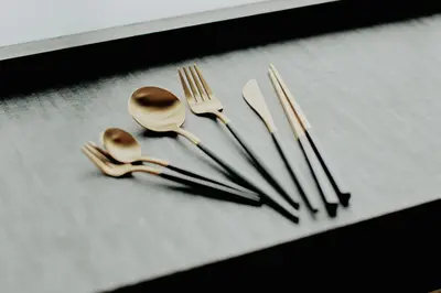 a group of utensils and forks and spoons at Hazama in Tokyo