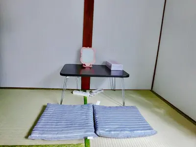 a room with a table and a bed at 4mins from sky tree Sumida area 3rooms Wifi in Tokyo