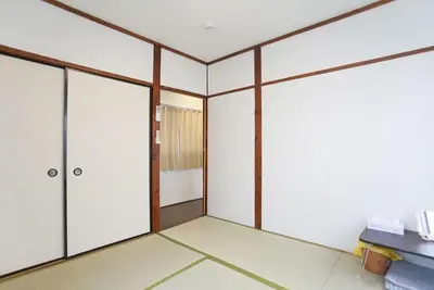an empty room with white walls and glass doors at 4mins from sky tree Sumida area 3rooms Wifi in Tokyo