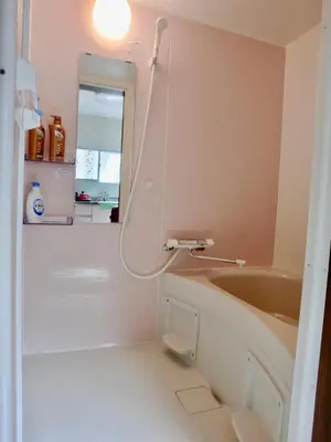 a bathroom with a sink and a mirror at 4mins from sky tree Sumida area 3rooms Wifi in Tokyo