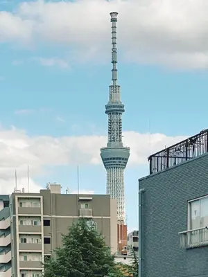 auckland tower in the background of a city with buildings at Asakusa Sakura-4F in Tokyo