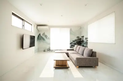 a living room with a couch and a coffee table at WANOYADO Tokyo - Shinjuku & Shibuya 8min - 3BR 81m2House - 10ppl - Family Friendly in Tokyo
