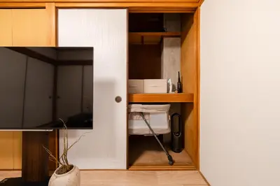 a door into a room with a desk and a chair at SKY Building 301 - Skytree View Studio - Easy Airport Access in Tokyo