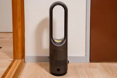 an iron is sitting on the floor next to a door at SKY Building 301 - Skytree View Studio - Easy Airport Access in Tokyo