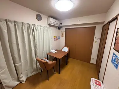 a room with a table and a chair and a window at S,F, Heights - Vacation STAY 19865 in Tokyo