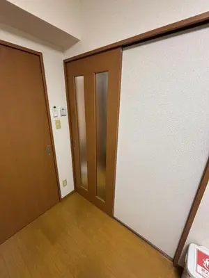 an empty room with two sliding doors and wooden floors at S,F, Heights - Vacation STAY 19865 in Tokyo