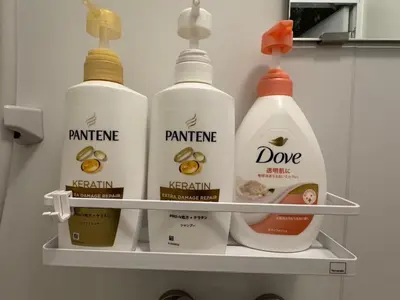 four bottles of laundry detergent on a shelf at Dai2 Narumitsu Building 301 - Vacation STAY 29234v in Tokyo