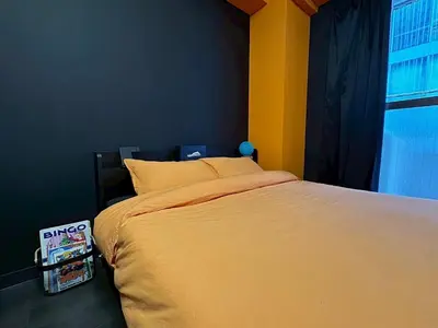 a bedroom with a bed and a window at Dai2 Narumitsu Building 301 - Vacation STAY 29234v in Tokyo