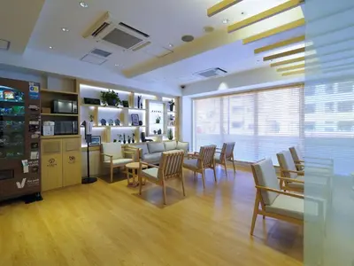 a salon with a waiting room with chairs and tables at Far East Village Hotel Tokyo Asakusa - Vacation STAY 46814v in Tokyo