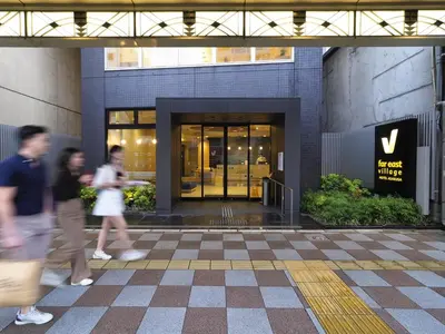 people walking in front of a building at Far East Village Hotel Tokyo Asakusa - Vacation STAY 46814v in Tokyo