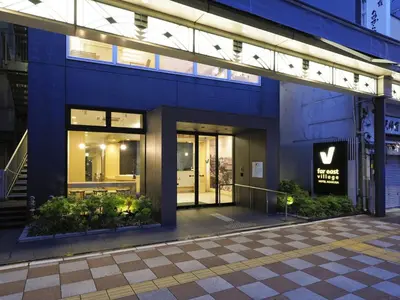 a building with a sign on the side of it at Far East Village Hotel Tokyo Asakusa - Vacation STAY 46931v in Tokyo