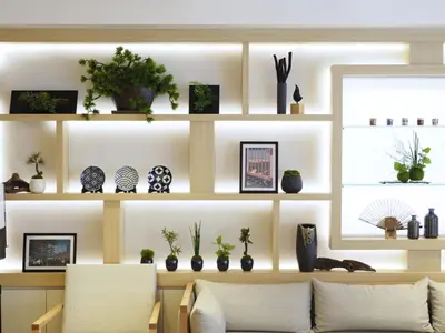 a living room with shelves with plants and vases at Far East Village Hotel Tokyo Asakusa - Vacation STAY 46931v in Tokyo