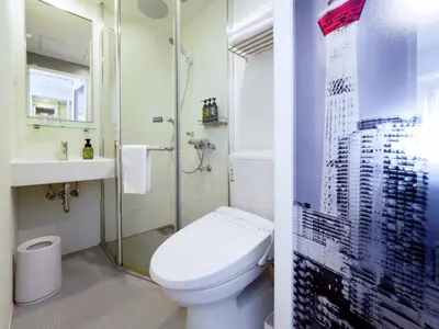 a bathroom with a toilet and a shower at Far East Village Hotel Tokyo Asakusa - Vacation STAY 46944v in Tokyo