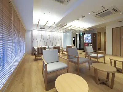a waiting room with chairs and tables and a dining area at Far East Village Hotel Tokyo Asakusa - Vacation STAY 46944v in Tokyo