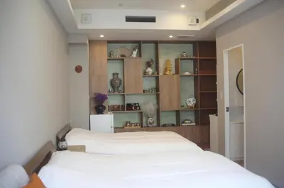 a bedroom with a large white bed in a room at aMIYAVI 2F in Tokyo