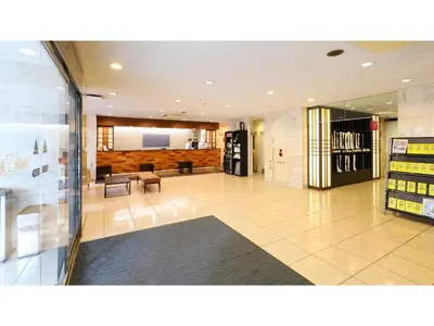 a lobby of a store with a waiting room at Smile Hotel Tokyo Ayase Ekimae - Vacation STAY 62844v in Tokyo