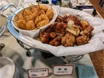 a platter of food on a table with a plate of food at Smile Hotel Tokyo Ayase Ekimae - Vacation STAY 62850v in Tokyo