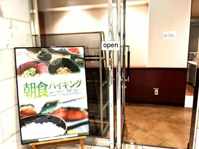 an open sign on the door of a restaurant at Smile Hotel Tokyo Ayase Ekimae - Vacation STAY 62870v in Tokyo