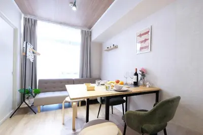 a dining room with a table and chairs at Belshaart Kamikitazawa - Vacation STAY 20402 in Tokyo