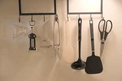 a group of kitchen utensils hanging on a wall at Kapalua East-Kapalua West - Vacation STAY 20389 in Tokyo