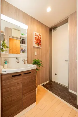 a bathroom with a sink and a mirror at 201 6-min walk from Higashi-Jūjō Station Cozy 1-Bedroom Apartment Direct Access to Akihabara & Ueno in Tokyo