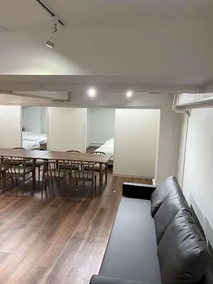 a living room with a couch and a table at Mizuochi Building No, 1, 1F - Vacation STAY 67443v in Tokyo