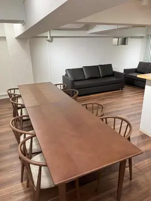 a table and chairs in a room with a couch at Mizuochi Building No, 1, 1F - Vacation STAY 67443v in Tokyo