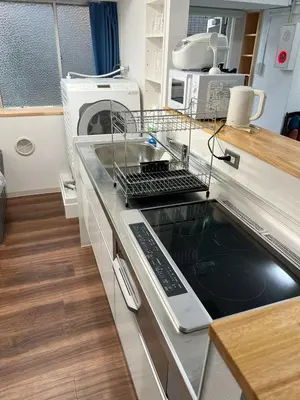 a kitchen with a dish drying rack on a sink at Mizuochi Building No, 1, 1F - Vacation STAY 67443v in Tokyo