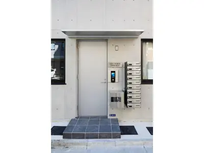 a front door of a building with a white door at LIFE TOWN OSHIAGE - Vacation STAY 20455 in Tokyo