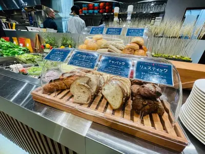 a display of bread and pastries in a store at LIFE TOWN OSHIAGE - Vacation STAY 20455 in Tokyo
