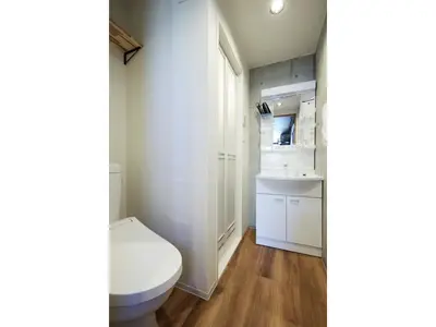 a white bathroom with a toilet and a sink at LIFE TOWN OSHIAGE - Vacation STAY 20456 in Tokyo