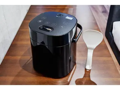 a black coffee maker on a table next to a spoon at LIFE TOWN OSHIAGE - Vacation STAY 20459 in Tokyo