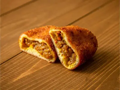 a close up of a piece of food on a table at LIFE TOWN OSHIAGE - Vacation STAY 20459 in Tokyo