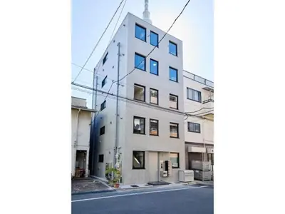 a tall white building on the side of a street at LIFE TOWN OSHIAGE - Vacation STAY 20459 in Tokyo