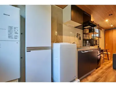 a kitchen with a refrigerator and a stove at LIFE TOWN OSHIAGE - Vacation STAY 20459 in Tokyo